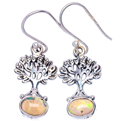 Sterling silver tree earrings with dangling oval opal cabochons, fishhook hooks