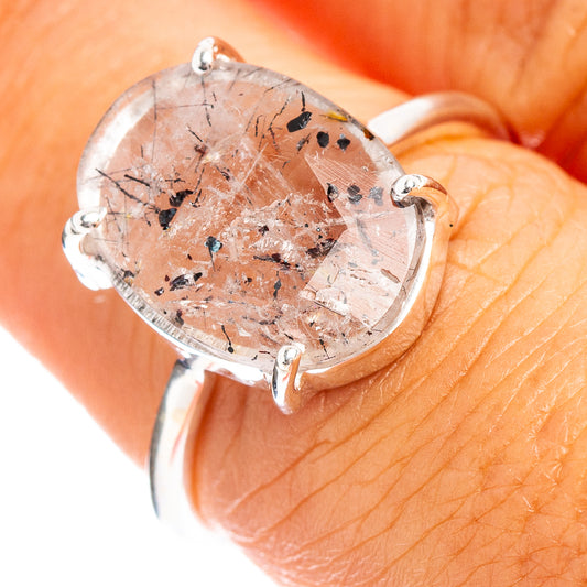 Faceted cacoxenite ring in .925 sterling silver, oval stone with speckled inclusions
