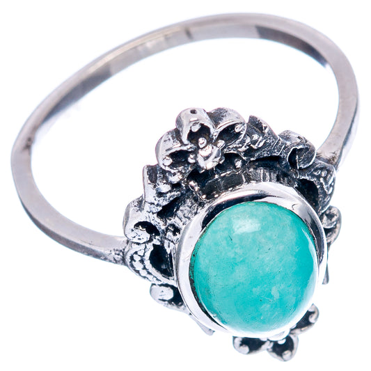 Sterling silver ring with round turquoise-green amazonite cabochon and detailed openwork band
