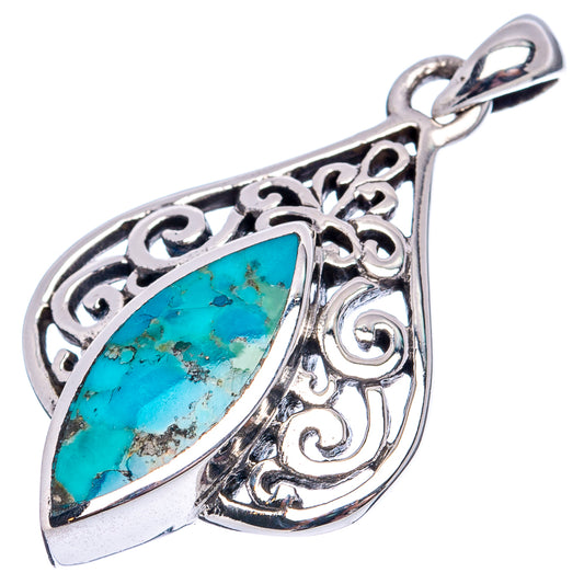 Turquoise teardrop pendant with detailed filigree border and bail loop, sterling silver