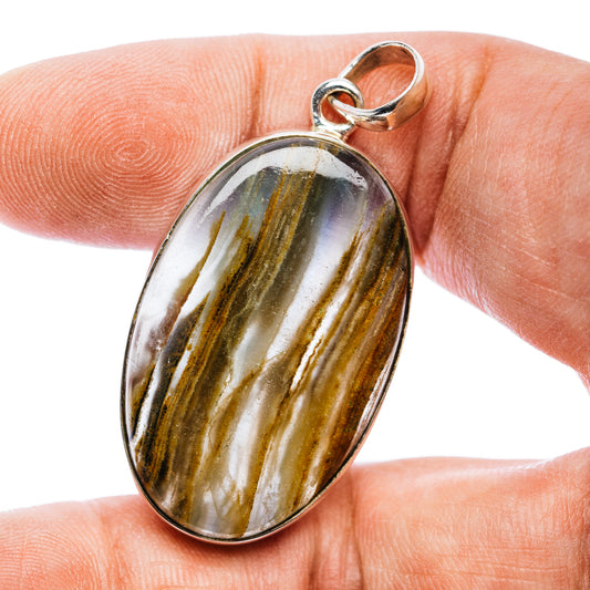 Oval calcite pendant with gold and green banded stone, .925 sterling silver bezel and bail