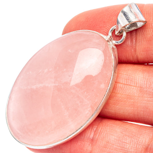 Rose quartz pendant, oval pink stone with silver-plated bail and setting