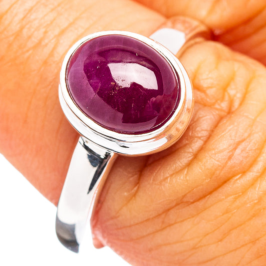Sterling silver ruby gemstone oval ring with deep purple-red stone, size 8.25