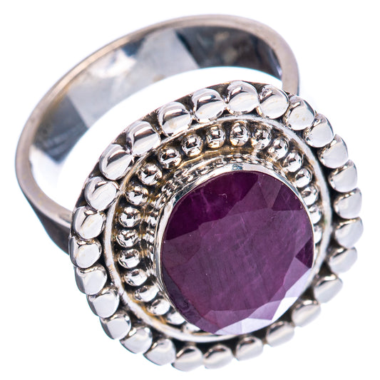Sterling silver ring showing round purple ruby cabochon and beaded side band