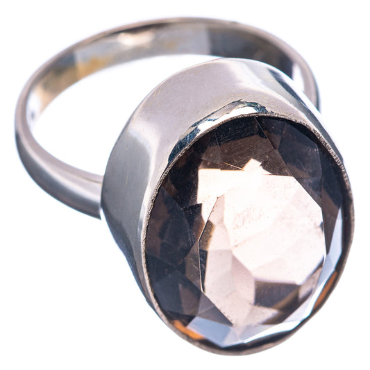 Oval faceted smoky dark gemstone ring on polished sterling silver band