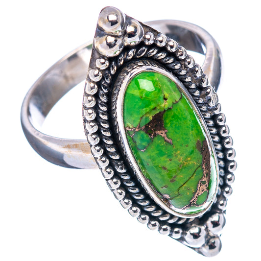Sterling silver ring with oval green turquoise stone and twisted beaded setting
