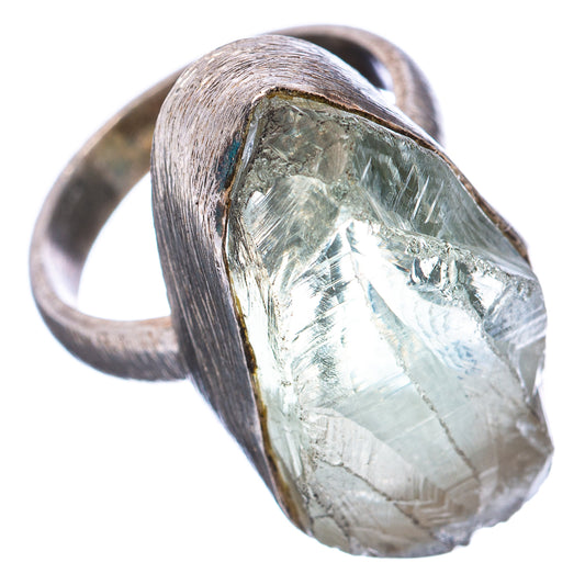 Raw amethyst ring, .925 sterling silver band with side view of faceted raw crystal.
