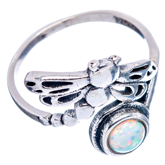 Sterling silver dragonfly ring, side view, with round opal bezel and openwork wings