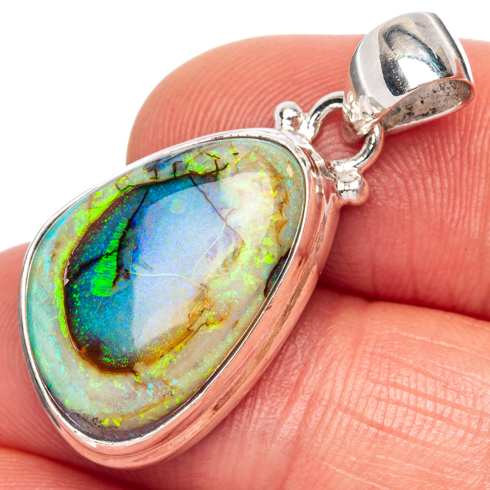 Sterling silver opal pendant with oval multicolor stone and teardrop bail
