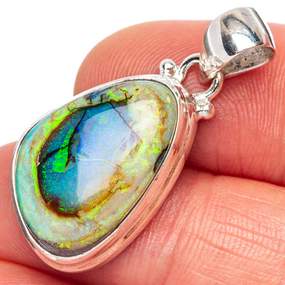 Sterling silver opal pendant with oval multicolor stone and teardrop bail