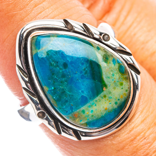 Oval blue opal ring in .925 sterling silver with ornate split shank