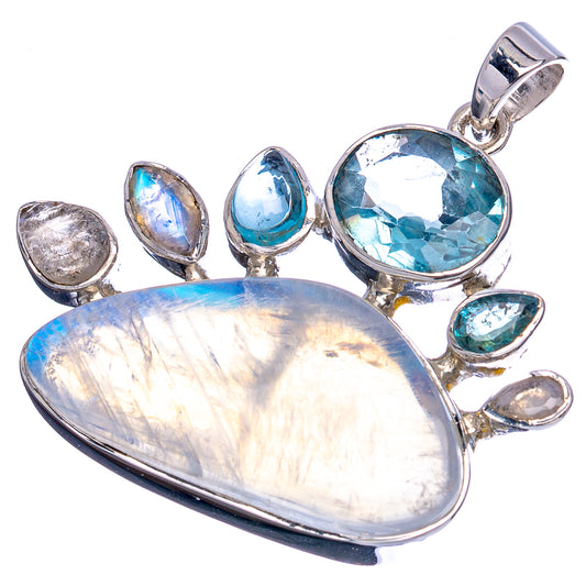 Sterling silver pendant with oval rainbow moonstone cabochon and blue topaz stones, bail