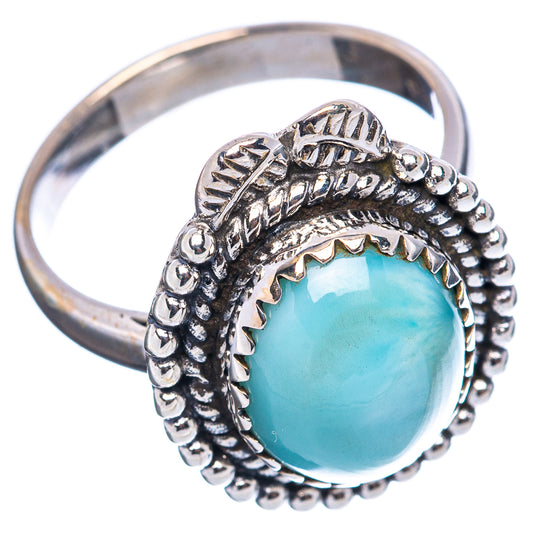 Sterling silver ring with oval light blue larimar gemstone and raised beaded edge band