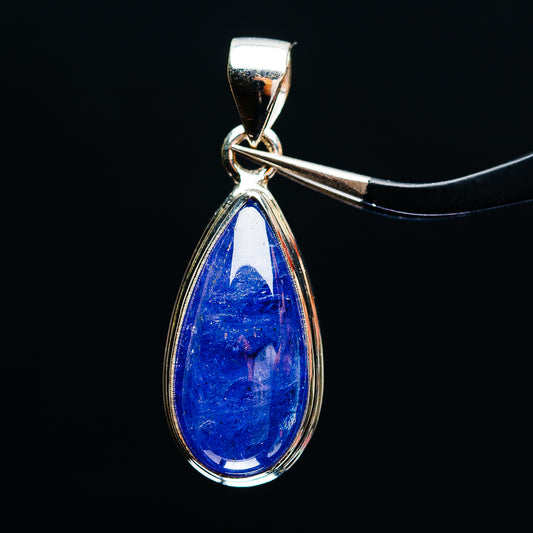 Sterling silver tanzanite pendant with blue pear-shaped gemstone in teardrop frame