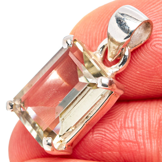 Rectangular green amethyst pendant with silver prongs and round bail