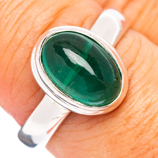 Sterling silver emerald ring with oval green gemstone bezel setting