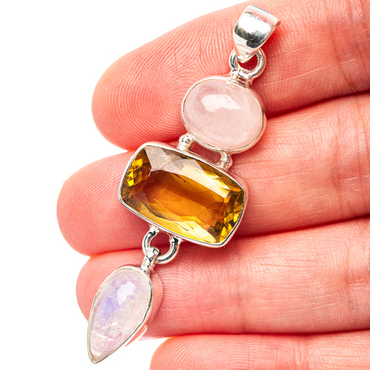 Sterling silver pendant with yellow citrine, pink rose quartz, and moonstone drops