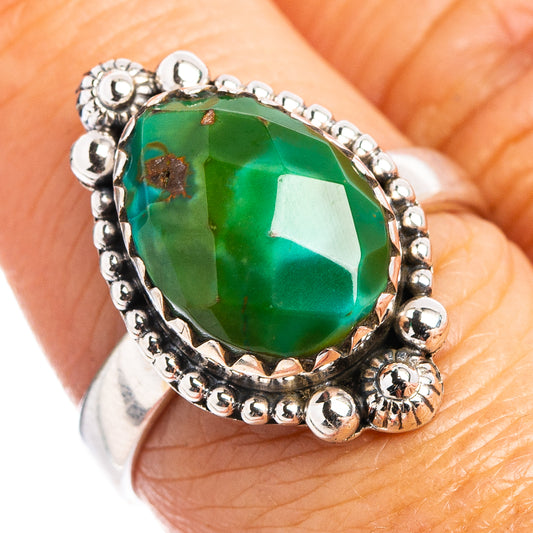 Sterling silver ring with large oval green turquoise cabochon and beaded halo