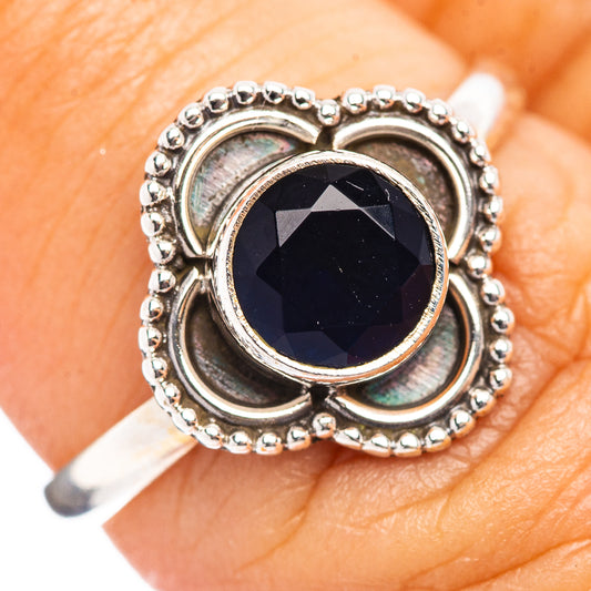 Sterling silver ring with round dark blue gemstone and bead halo, size 6.75