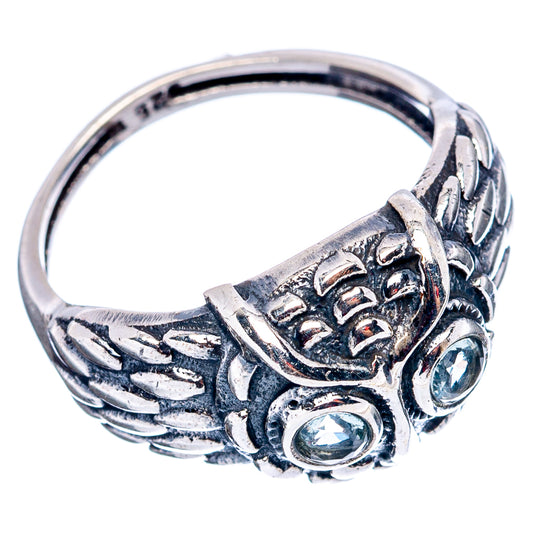 Sterling silver owl ring with blue gemstone accents, side view of band and setting