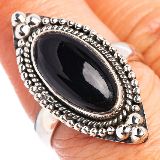 Black onyx oval ring with beaded sterling-silver band, size 7.25, .925