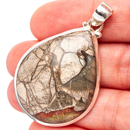 Mushroom rhyolite pendant teardrop sterling silver bezel with mottled stone face detail