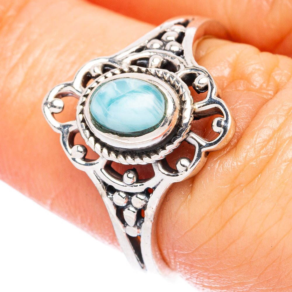 Sterling silver dainty ring with oval turquoise gemstone and ornate openwork band