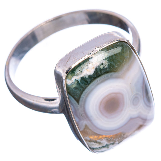 Sterling silver ring with ocean jasper oval stone, green top and white swirl details.