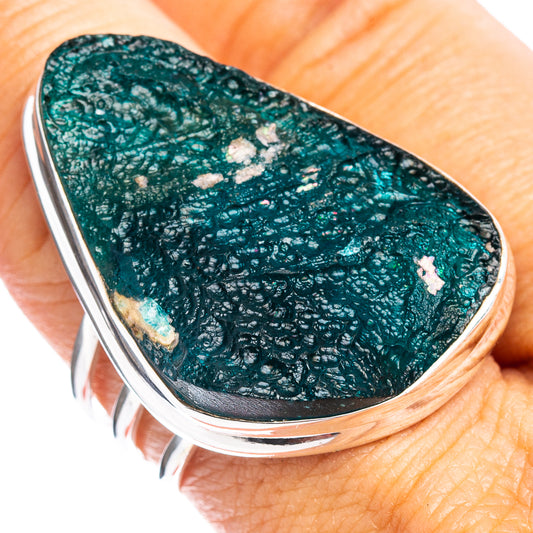Oval teal roman glass ring with silver bezel and polished edge