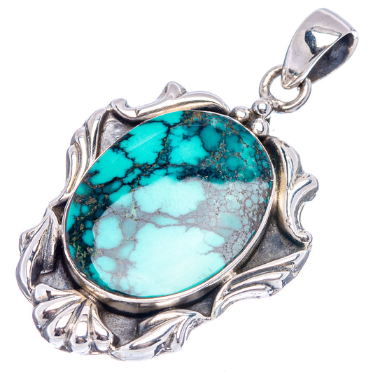 Sterling silver turquoise pendant with oval cabochon, scalloped border, and bail loop