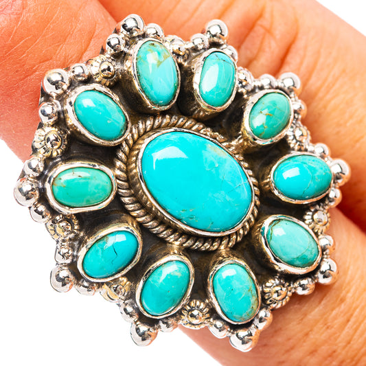 Sterling silver turquoise cabochon ring with large oval center and small oval stones