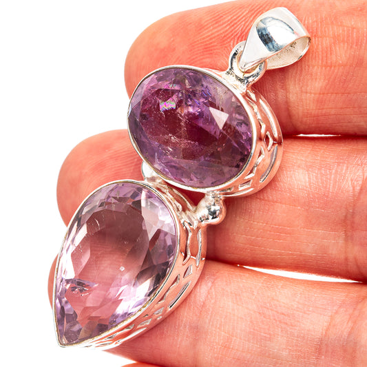 Sterling silver pendant with two faceted oval amethyst stones, double-drop design