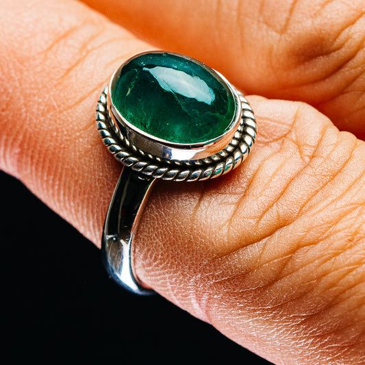 Sterling silver ring with oval green emerald cabochon and rope bezel, size 7.75