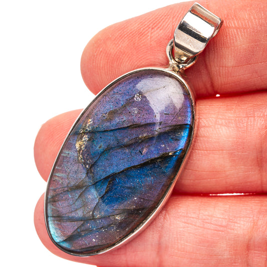Labradorite pendant in oval cabochon with 925 sterling silver bezel and bail