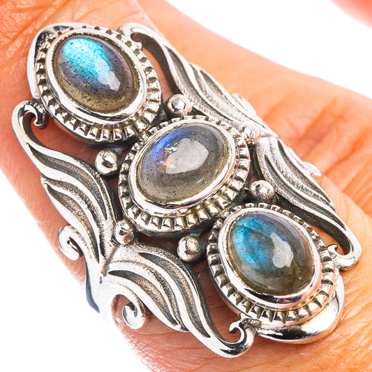 925 sterling silver labradorite ring with three oval blue-green stones in ornate settings