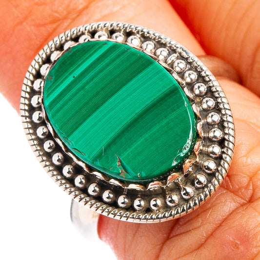 Sterling silver malachite ring with oval green cabochon and beaded halo setting