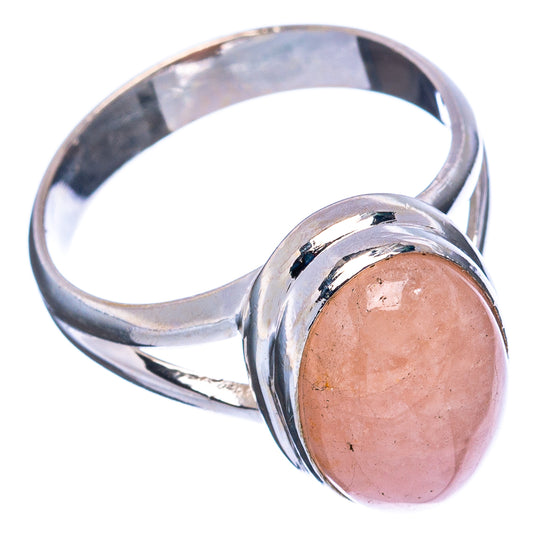 Sterling silver rose quartz cabochon ring, side angle showing wide band and stone