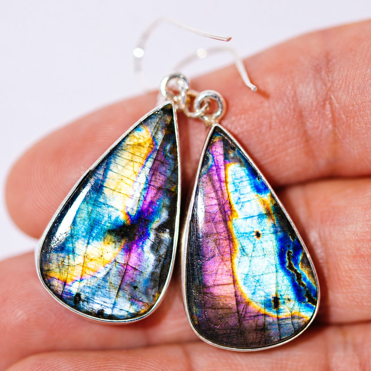 925 sterling silver teardrop earrings with iridescent blue-purple stone