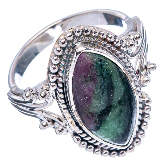 Sterling silver gemstone ring with oval purple-green cabochon, beaded border, split band accents