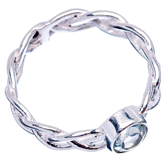 Sterling silver dainty ring with round blue topaz bezel, open twist band view