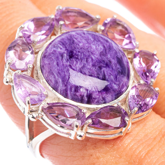 Sterling silver halo ring with oval charoite cabochon and faceted purple amethyst stones