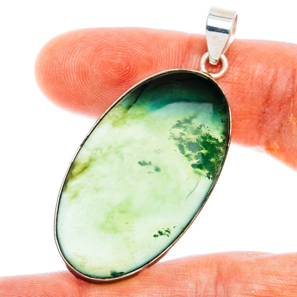 Oval green nephrite jade pendant with .925 sterling silver bezel and top loop