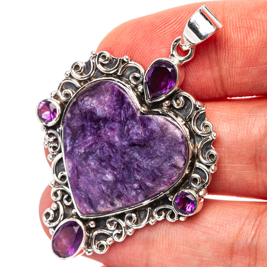 Heart amethyst pendant in .925 sterling silver with purple gemstone accents, bail top.