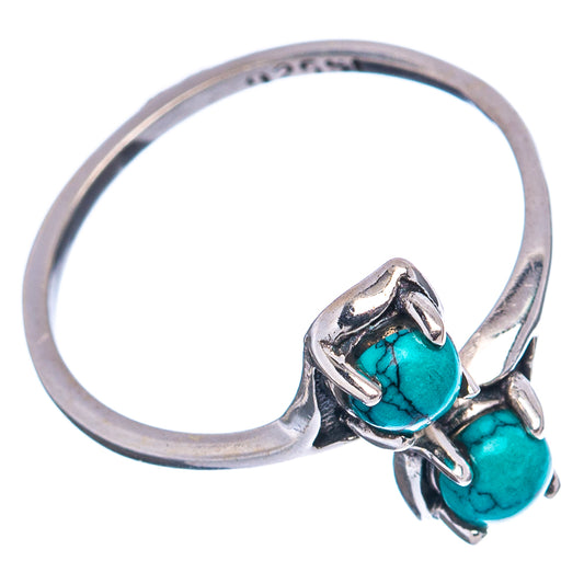 Adjustable sterling silver ring with two turquoise cabochon stones, dainty openwork setting