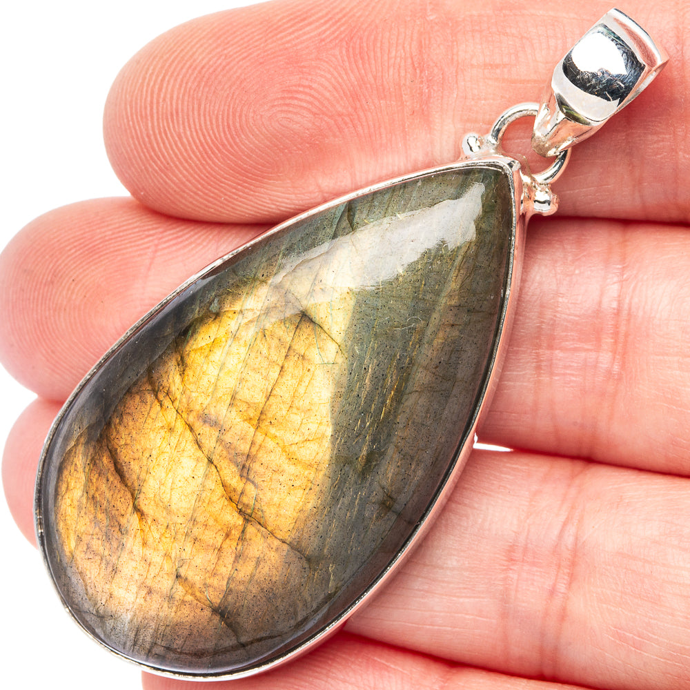 Teardrop labradorite pendant in 925 sterling silver, yellow-green flashes, close-up bail.