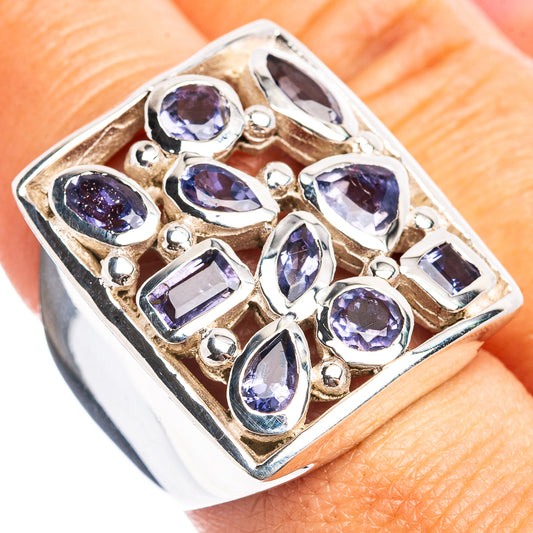 Sterling silver ring with square setting of purple oval and baguette stones