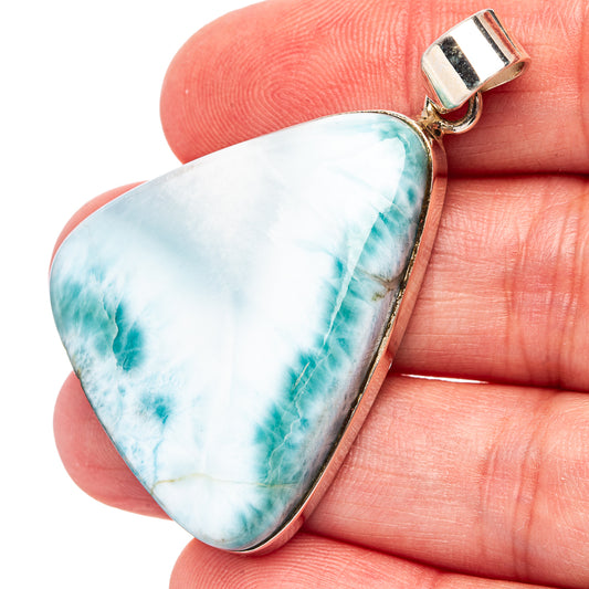 Sterling silver larimar pendant with teardrop blue stone and polished bail
