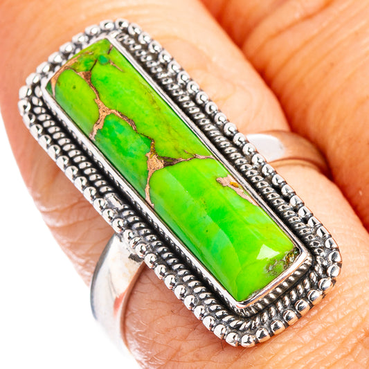 Sterling silver turquoise ring with rectangular green stone and rope bezel detail