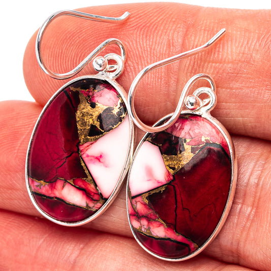 Oval dangle earrings in sterling silver with red-pink gemstone and gold flecks, fishhook