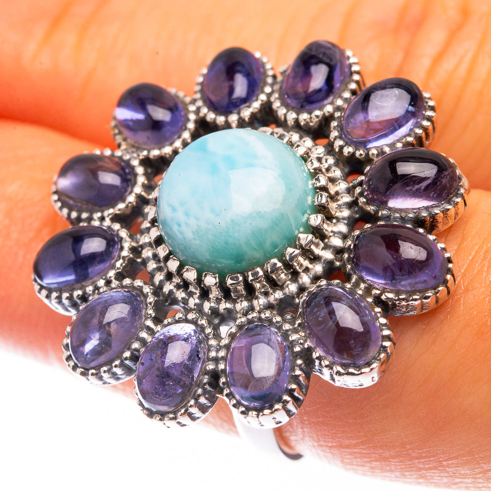 Sterling silver oval Larimar center ring with blue-violet oval gemstones around